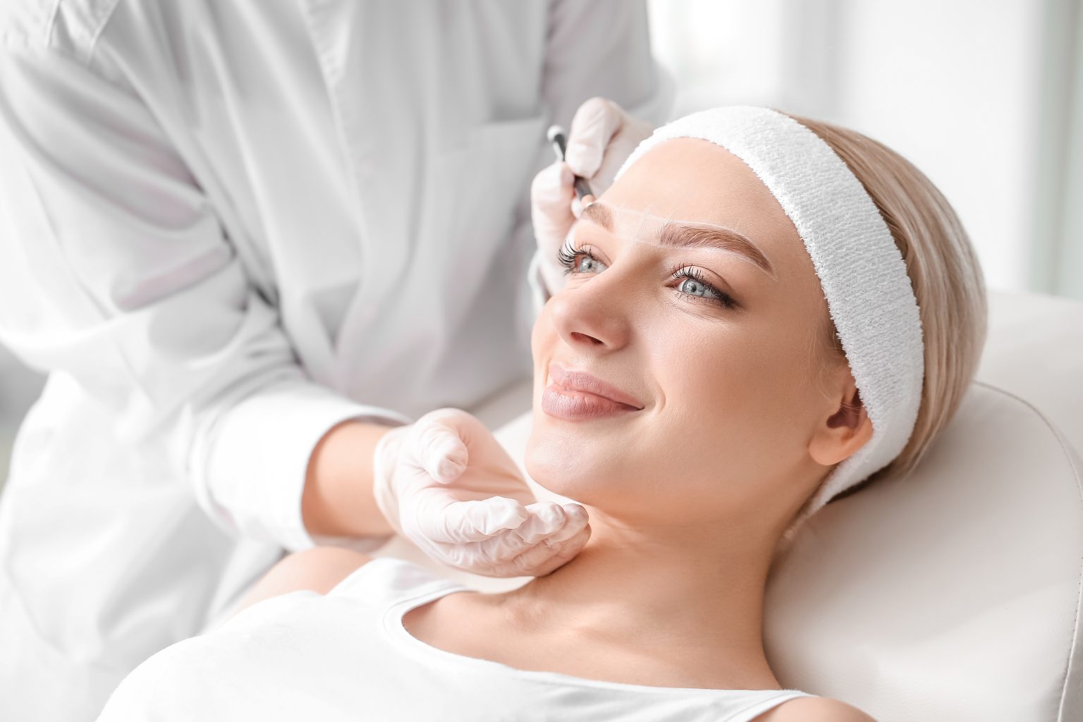 Practitioner carrying out a professional skin treatment