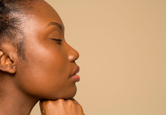 Profile of a woman with smooth, even skin