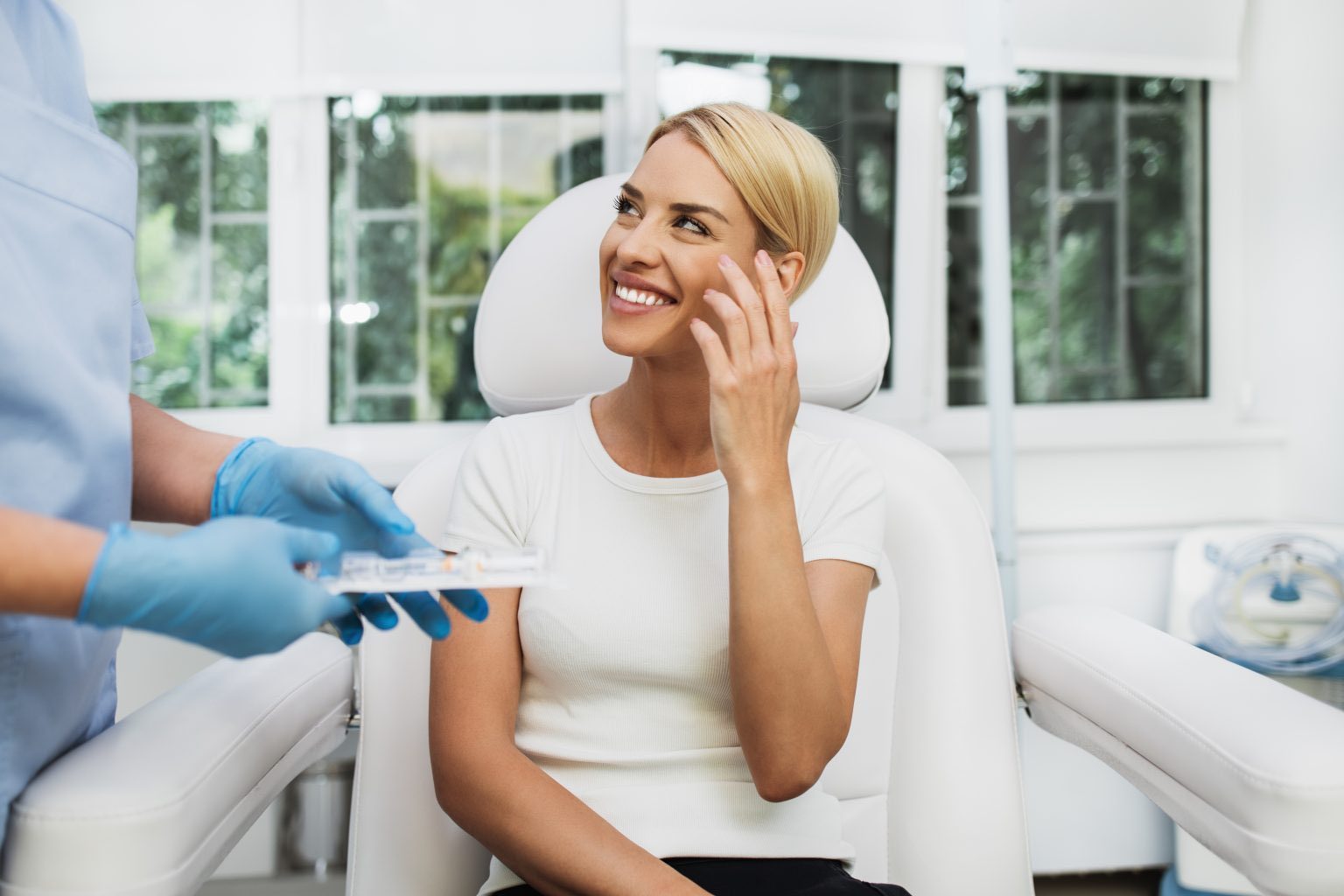 Patient smiling during a consultation in clinic