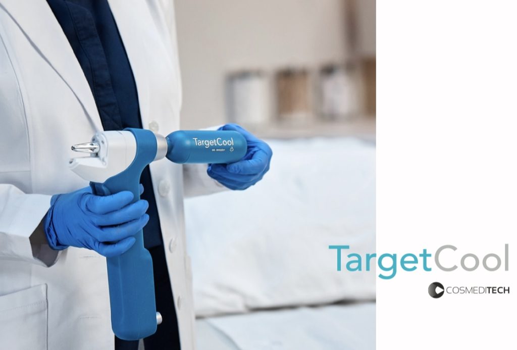 Practitioner holding a TargetCool device